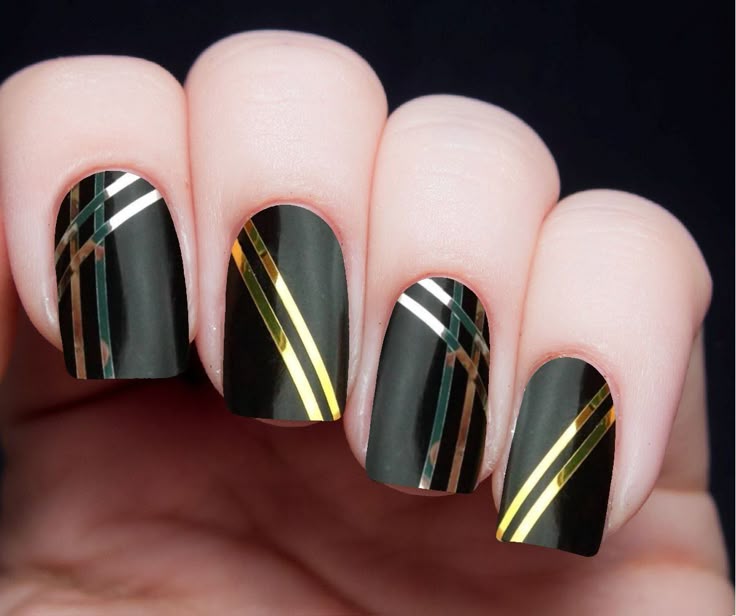 Gold-Striped Black Nails